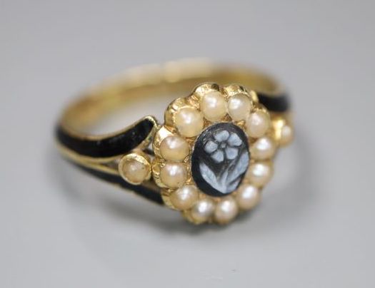 A Victorian 18ct gold, black enamel, seed pear and hardstone set oval mourning ring